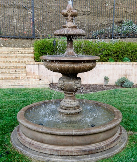 Outdoor fountain with lions piped for pond