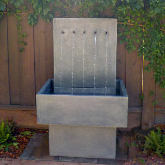 Tall wall fountain for outdoor garden or patio