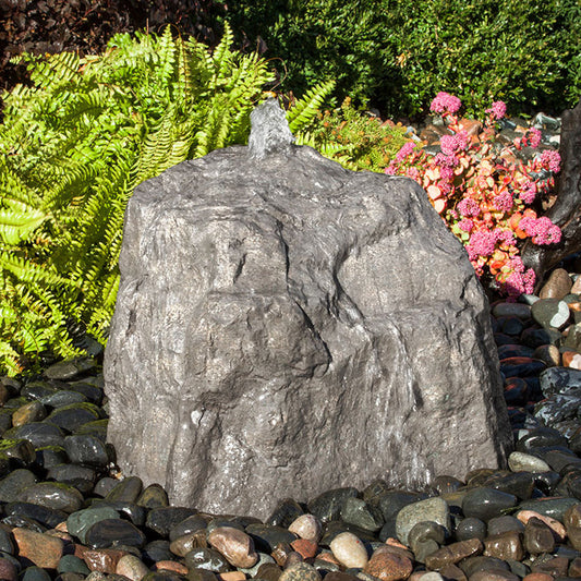 Outdoor garden fountain with cascading water feature