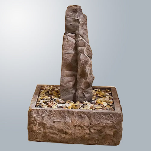 Small rock fountain for garden or patio