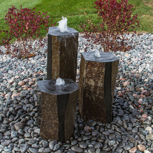Image of a semi polished basalt rock column fountain