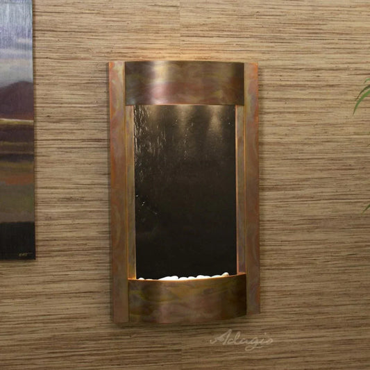 Wall fountain with flowing water