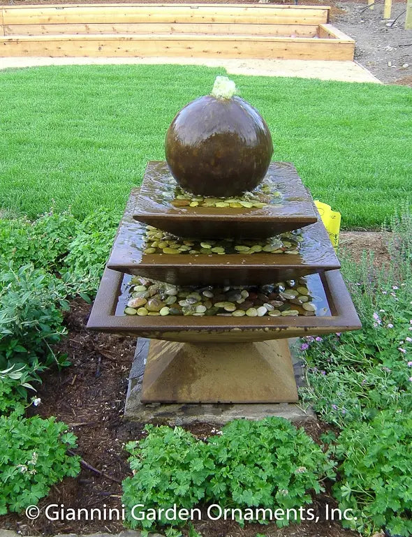 Image of a shallow three tier tapered square fountain.