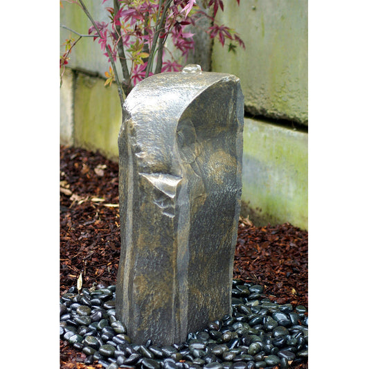 Outdoor fountain with a rock design