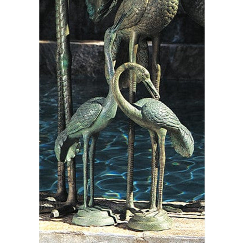 Small brass crane sculpture for garden or pool accent