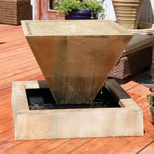 Image of a small oblique outdoor fountain.