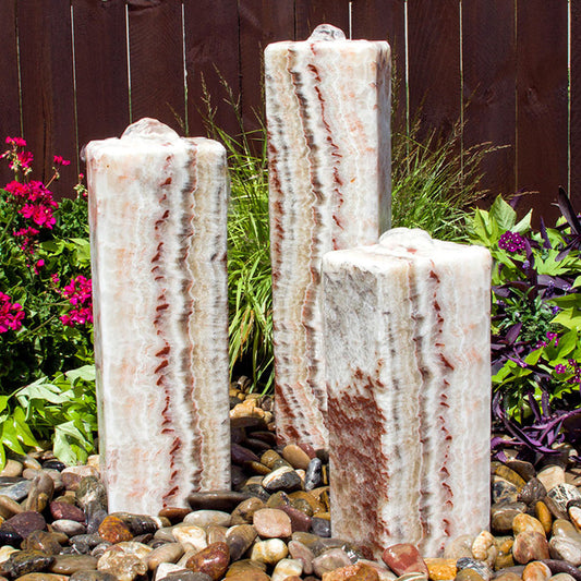 red onyx fountain smooth stone