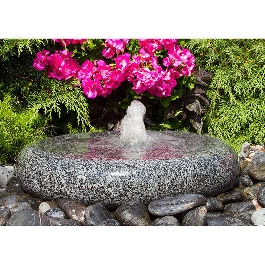 Image of a smooth round granite stone fountain