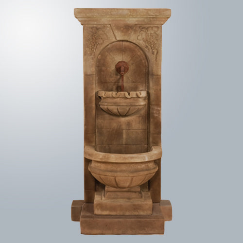 Outdoor water feature with step and rustic spout