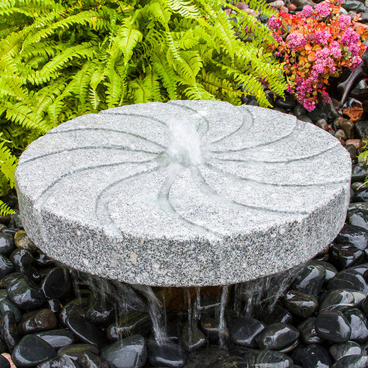 Swirl millstone granite stone fountain for garden or patio