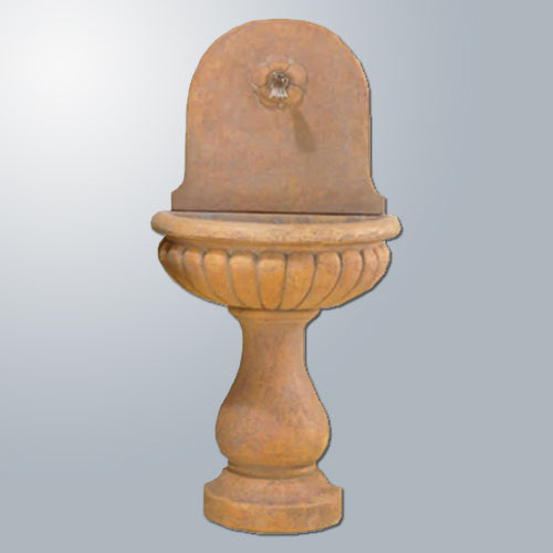 Outdoor wall fountain designed for a spout