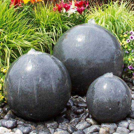 Black granite stone sphere water feature
