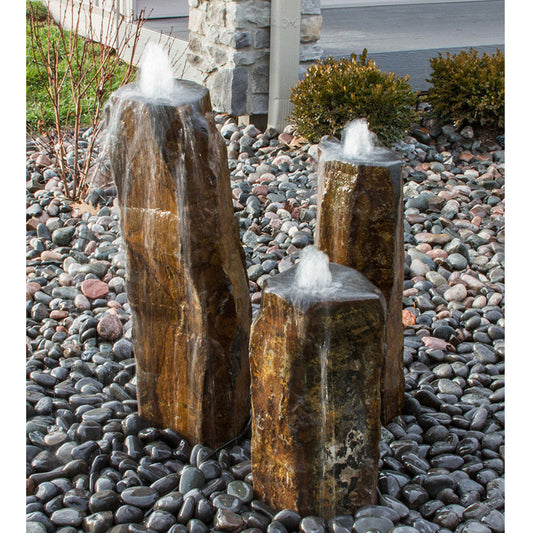 Outdoor fountain with three bowls and polished basalt columns