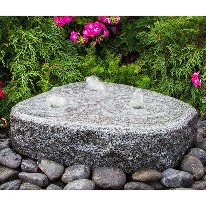 Image of a granite stone fountain with three circular tiers