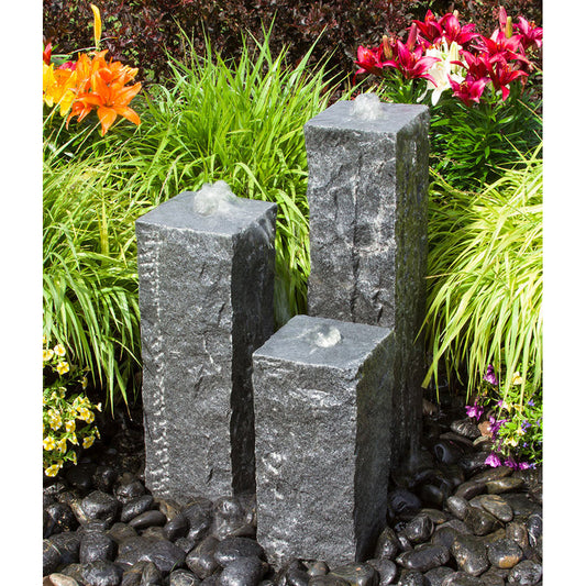 Image of a triple raw cut granite stone fountain.