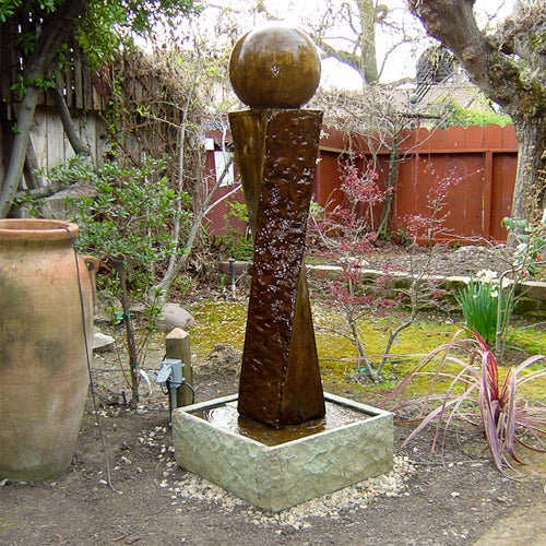 Twist rock water feature with sphere accent