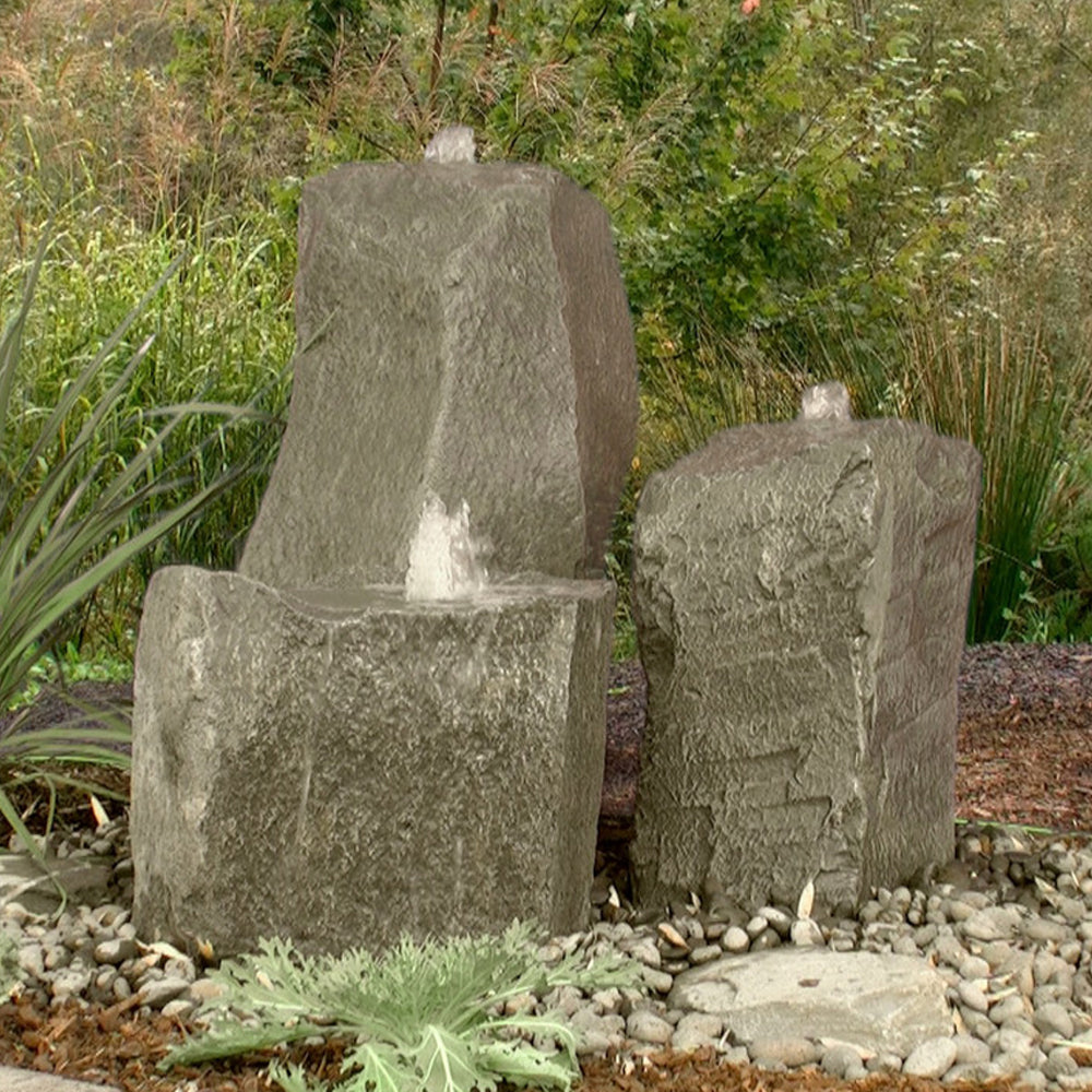 Outdoor fountain with three cascading stone tiers