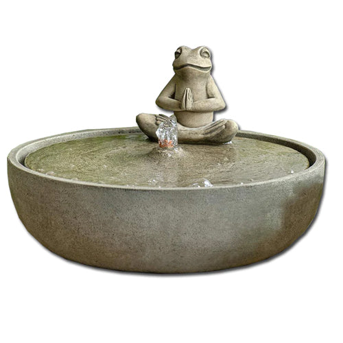 Cast stone garden fountain featuring a frog in a yoga pose