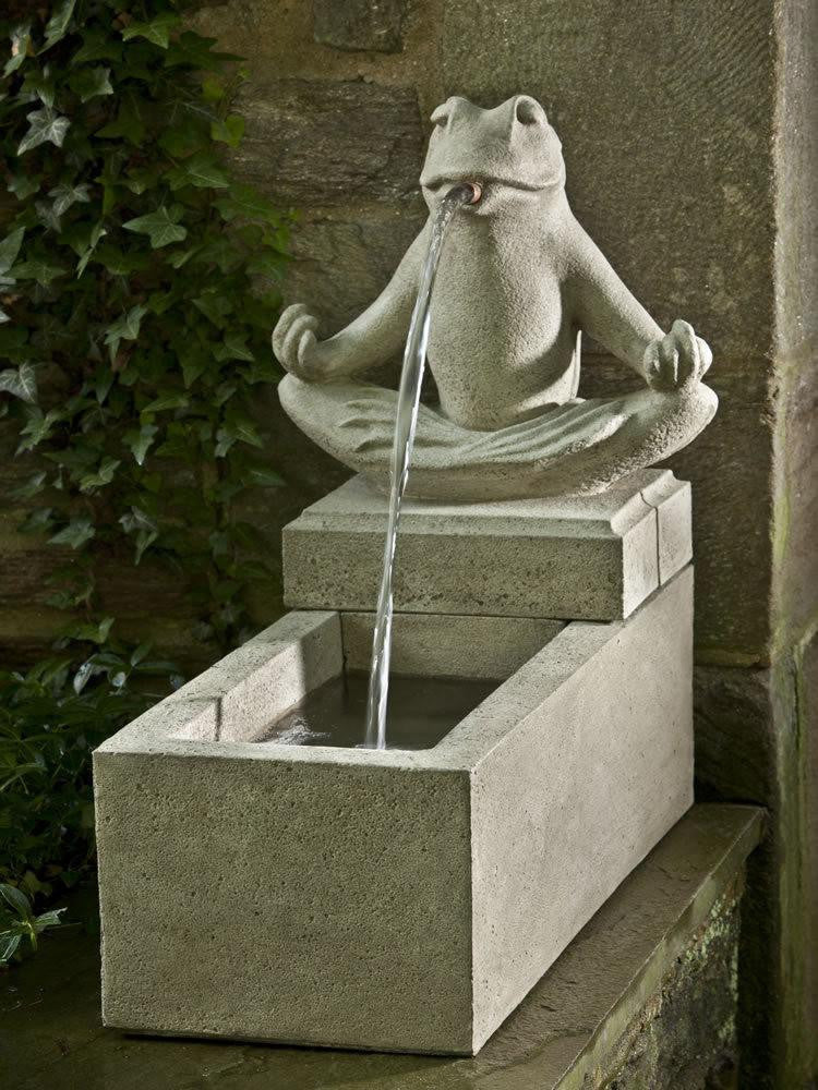 Image of a water fountain featuring a frog on a plinth in a zen style