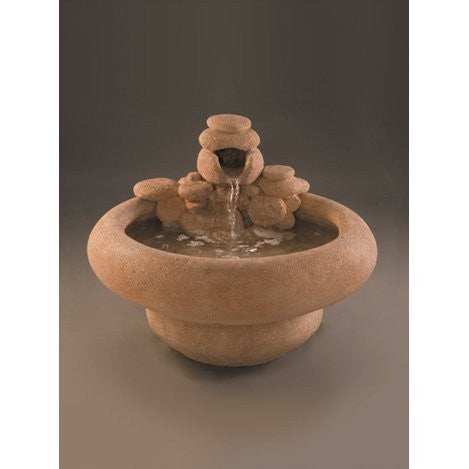 Image of a large cast stone garden fountain designed for serenity.