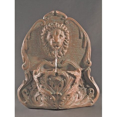 Cast stone outdoor wall fountain featuring a lion design