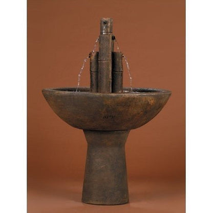 Cast stone garden fountain with bamboo design