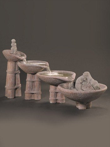 Tiered cast stone outdoor fountain with otters
