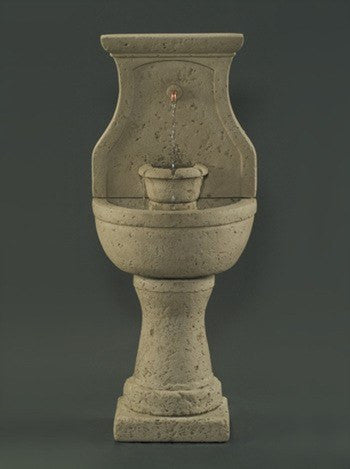 Outdoor wall fountain for a cottage garden