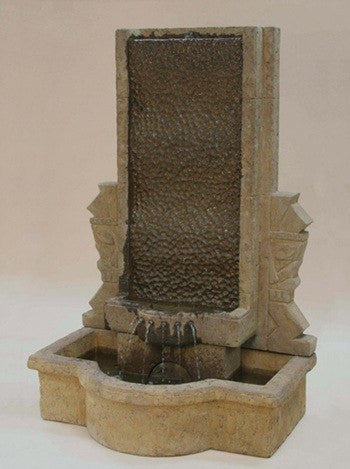 Cast stone wall fountain for outdoor use