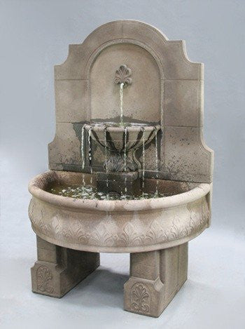 Outdoor wall fountain made of cast stone with pedestals