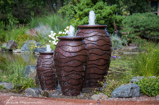 Image of decorative urns with a scalloped design